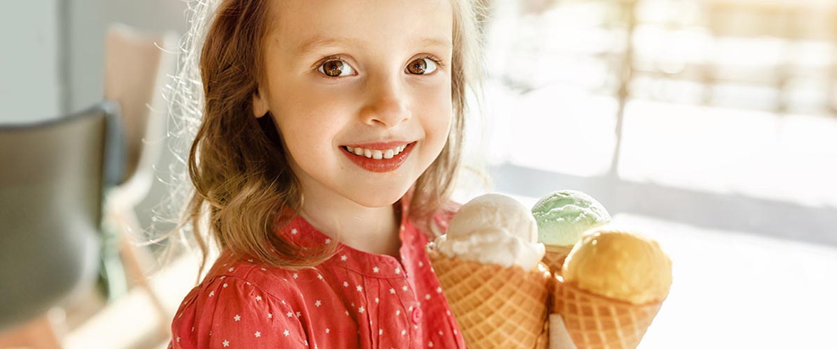 Girl with 3 ice cream cones