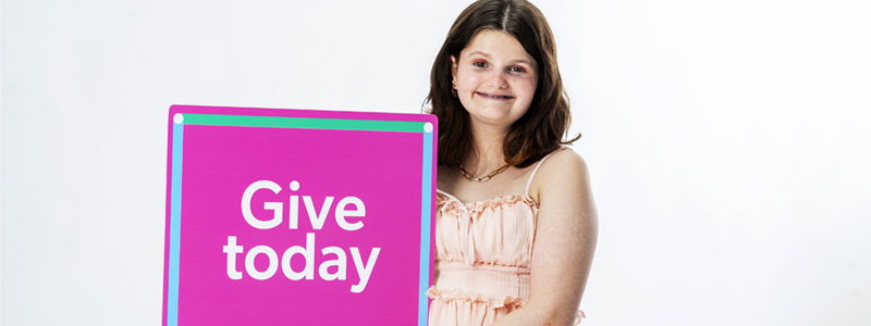 Girl with give today sign