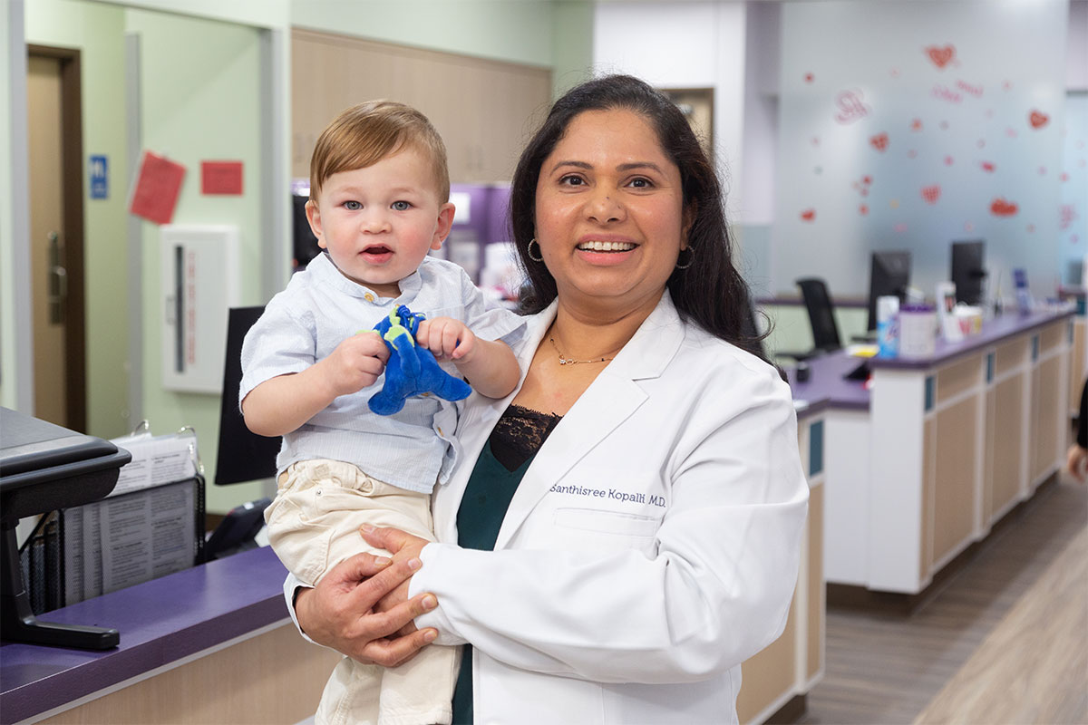 Dr. Kopalli with patient