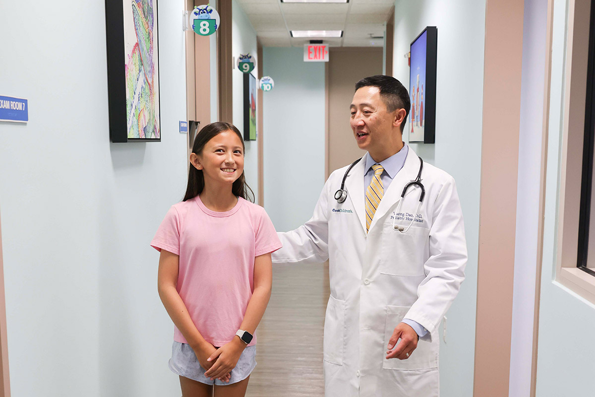 Dr. Dao speaking with girl patient