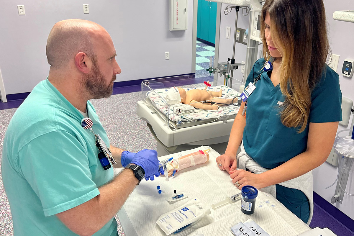 Nurse speaking to doctor