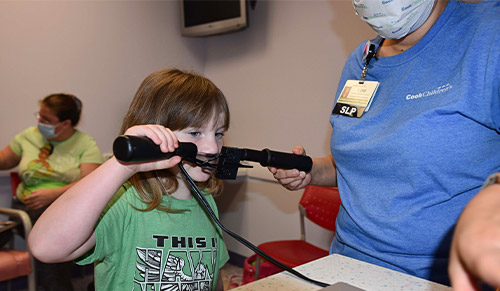 Girl using nasometer